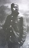 Георгий Бойе в форме летчика и шлеме.
